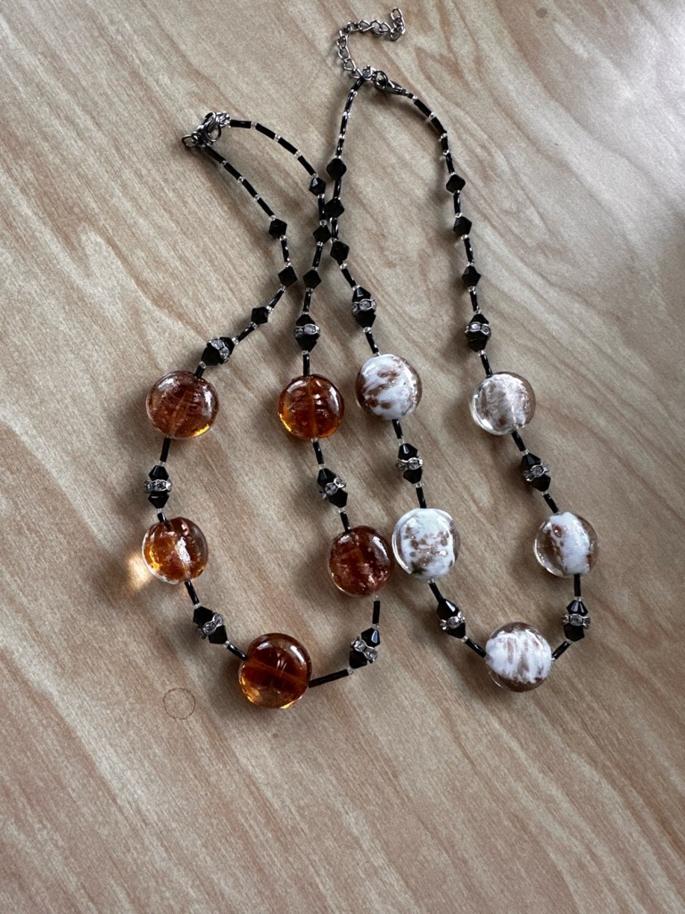 Amber and white Swirl Glass Beads two necklaces with Black beads and crystal